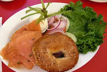 Finish with red onion, capers, dill and a squeeze of lemon. Serve at once, open-face.