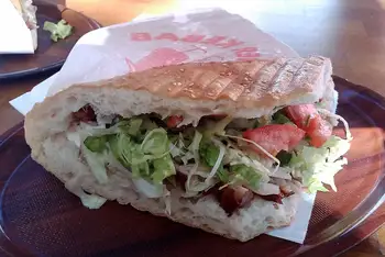 Wrap the bottom in paper, twist, and eat immediately while the meat is still crackling.