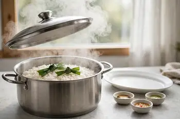 Cook the rice in 2 1/2 cups of the poaching broth with the pandan, then rest 10 minutes and fluff.