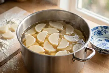 Cook the radish slices in the broth until translucent and tender. Keep warm.