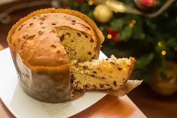 Push two long skewers through the base of the mold, then hang the panettone upside down between two pots or chairs. Cool completely, at least 4 hours 