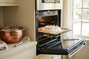 Put it in the oven and immediately turn the heat down to 250 °F (120 °C). Bake for 1 hour 15 minutes, until the shell is crisp and pale cream colored.