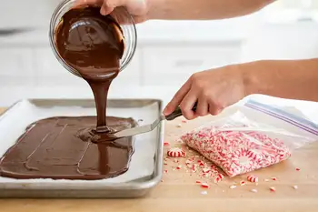 Melt the dark chocolate in a bowl set over barely simmering water, stirring until smooth, or microwave in 30 second bursts. Stir in the salt, pour ont